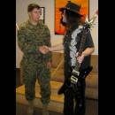 Presenting Autographed Guitar To Wounded Warriors